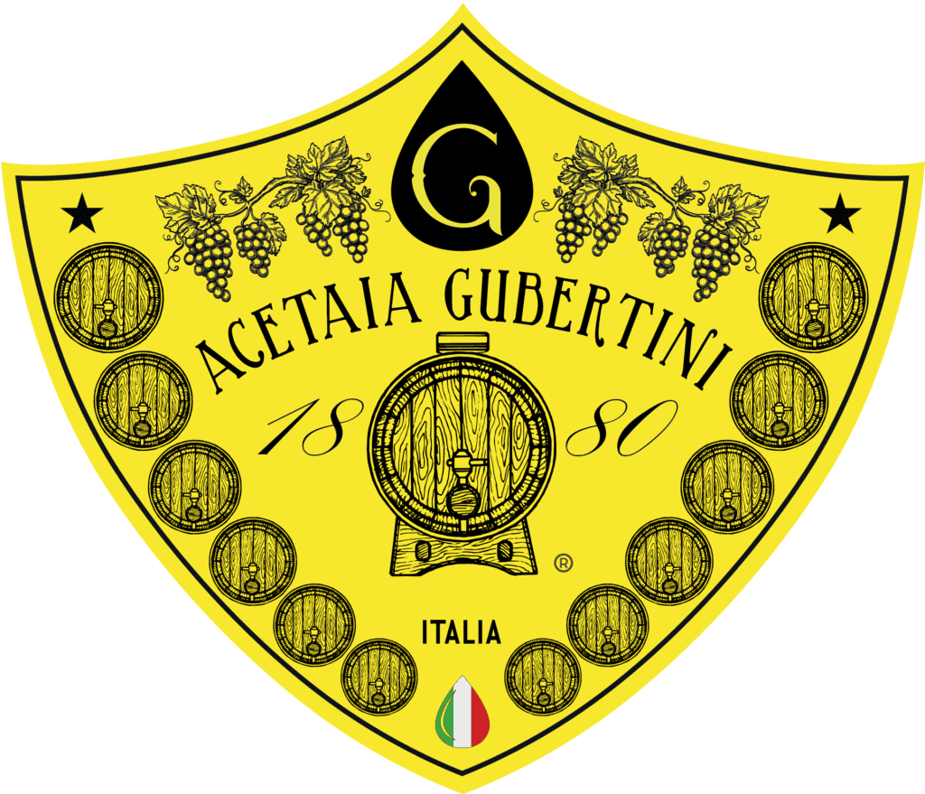 Fragile botti d'aceto balsamico tradizionale Gubertini, produzione artigianale italiana.