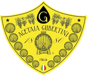 Fragile botti d'aceto balsamico tradizionale Gubertini, produzione artigianale italiana.